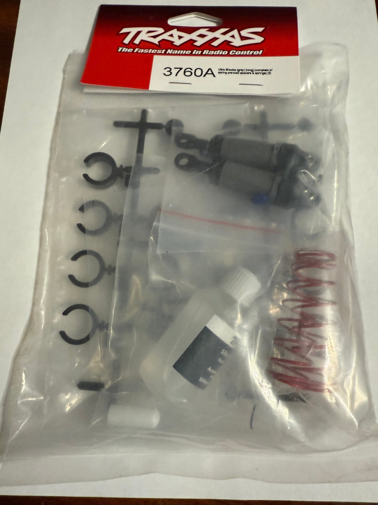 Traxxas 3760A  Ultra Shocks (gray) (long) (complete w/ spring pre-load spacers & springs) (2)