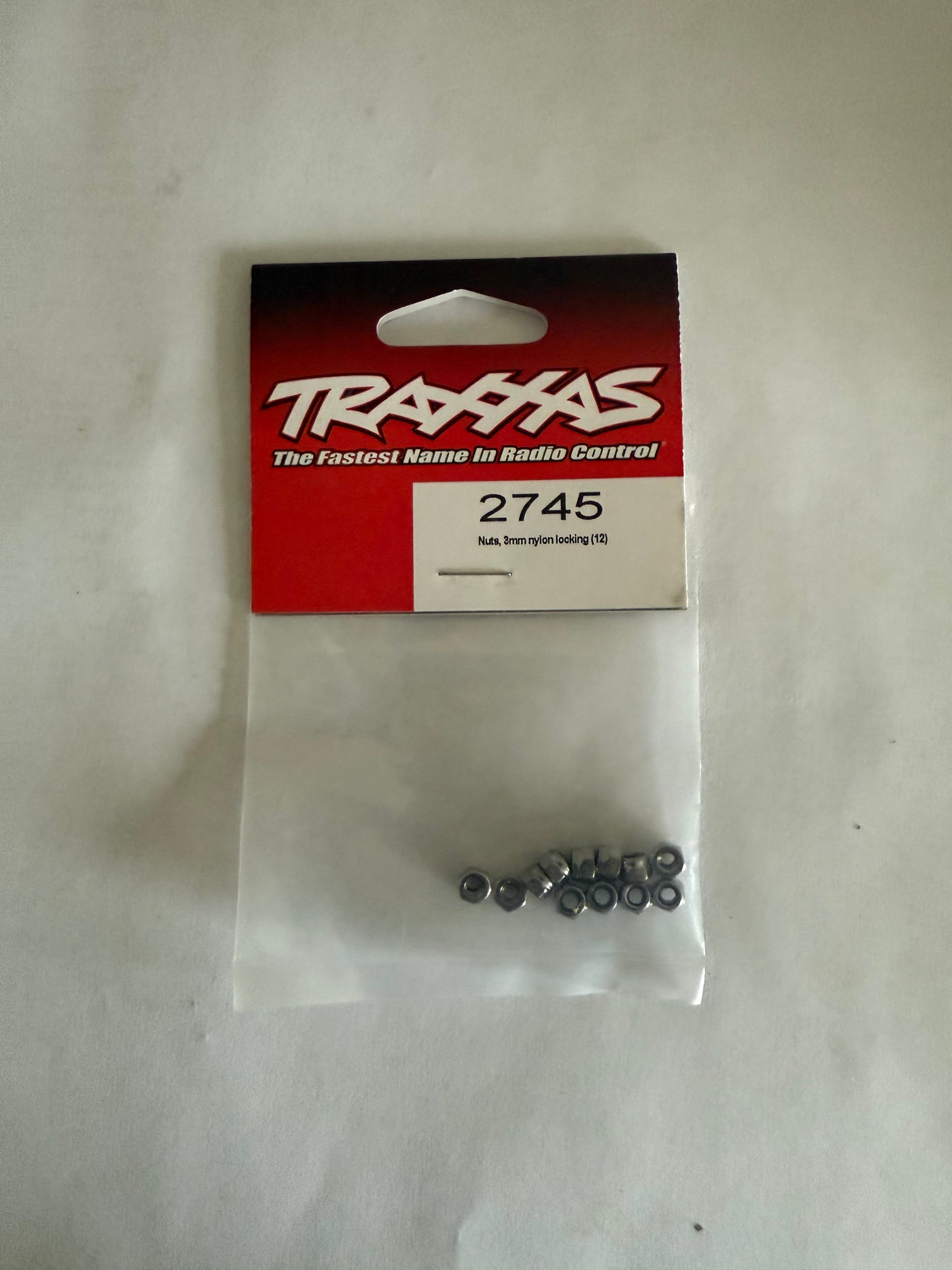 Traxxas 2745 Nuts, 3mm nylon locking (12)